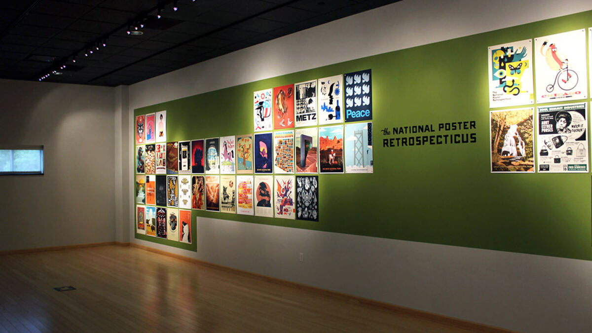 Gallery wall of exhibition posters