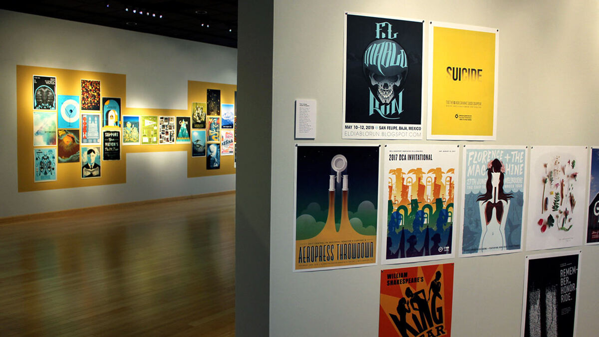 Student poster wall in the gallery